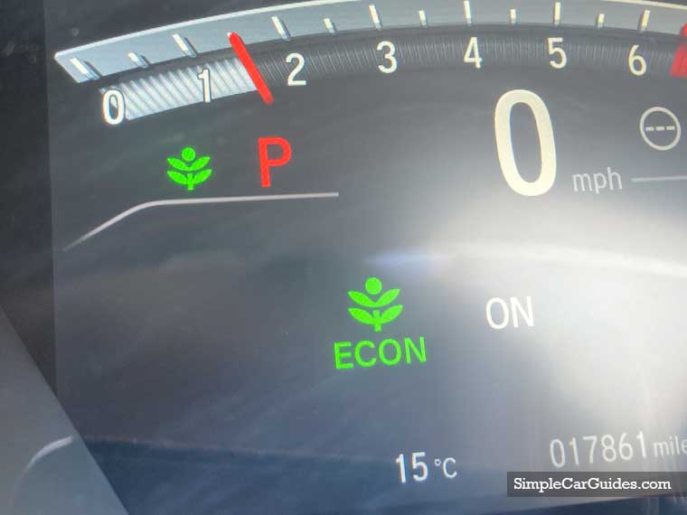 CR-V Econ button pressed green light